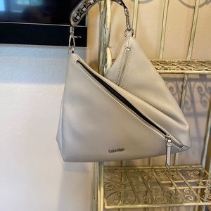 Calvin Klein light gray hobo bag never used